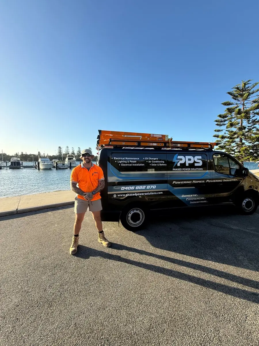 Ben Gray, founder of Phased Power Solutions, with the PPS van