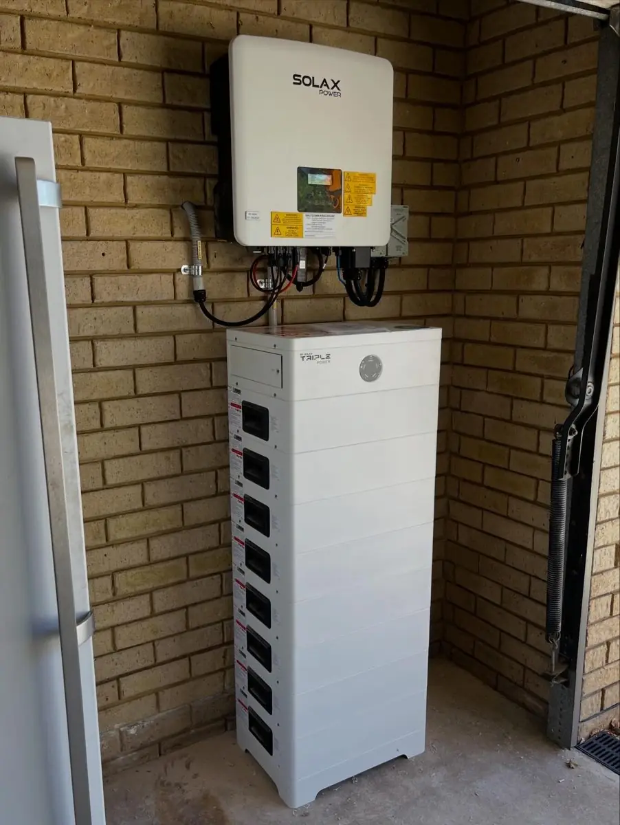 SolaX hybrid inverter above a stacked SolaX Triple Power battery